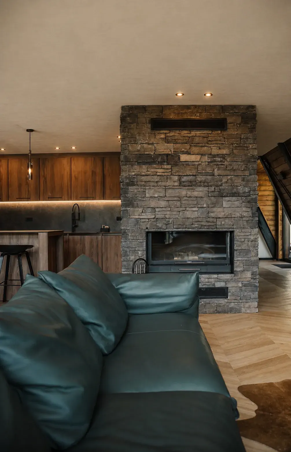 Indoor stone fireplace and lounge for cooler evenings